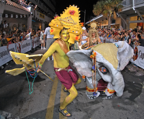 Costumed revelers, themed as "The Lotus People" march down Duval Street during the Fantasy Fest Parade in Key West, Fla. The 2010 parade is set to culminate Key West's annual Fantasy Fest costuming and masking festival on Saturday, Oct. 30, 2010.