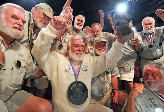David Douglas, center, celebrates at Sloppy Joe's Bar in Key West, Fla., after winning the 2009 "Papa" Hemingway Look-Alike contest. Hemingway Days 2010 festival kicks off Tuesday, July 20, and ends Sunday, July 25, honoring author Ernest Hemingway who lived in Key West in the 1930s.