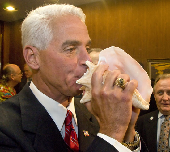Florida Gov. Charlie Crist blows a conch shell Tuesday, April 20, 2010, while greeting Florida Keys government and business leaders in his conference room at the State Capitol in Tallahassee, Fla. The Keys contingent spent Tuesday meeting with state legislators to reinforce issues important to the island community. "Florida Keys Days" activities are to wrap up Tuesday evening with a reception for legislators in the Capitol courtyard. (Andy Newman/Florida Keys News Bureau/HO)